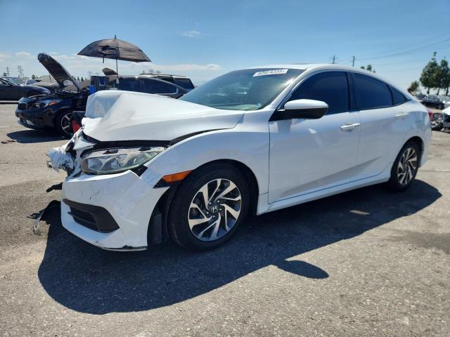 HONDA CIVIC EX 2018 with VIN 19XFC2F71JE207538 - Photo from auction