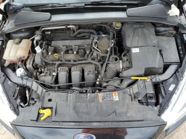 Photo 11 from auction – 2015 FORD FOCUS TITANIUM with VIN 1FADP3J2XFL353213