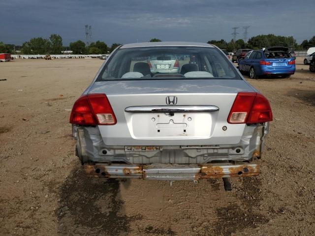 Photo 6 from auction – 2002 HONDA CIVIC LX with VIN 2HGES16512H536609