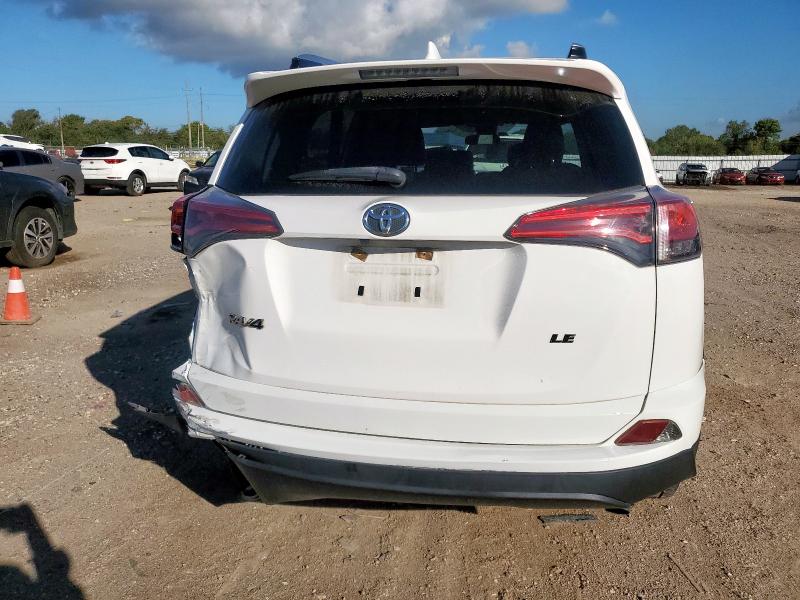 Photo 6 from auction – 2017 TOYOTA RAV4 LE with VIN JTMZFREV3HJ133209