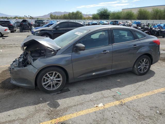 FORD FOCUS SE 2018 with VIN 1FADP3F25JL304079 - Photo from auction
