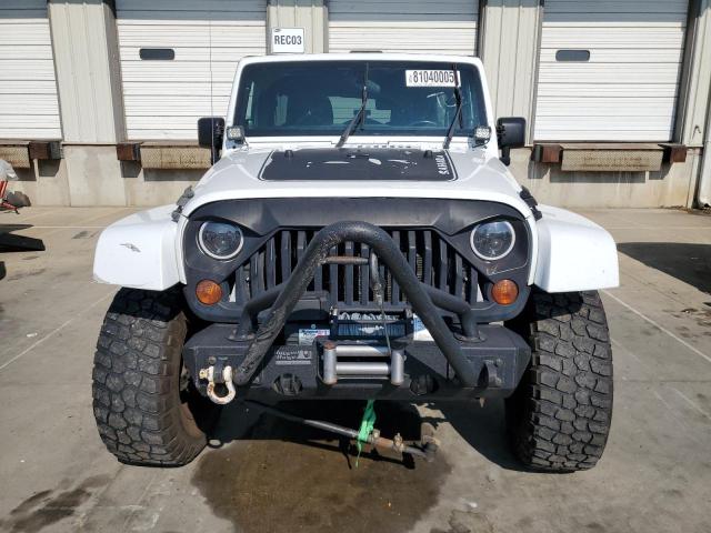 Photo 5 from auction – 2011 JEEP WRANGLER U with VIN 1J4BA5H18BL623829
