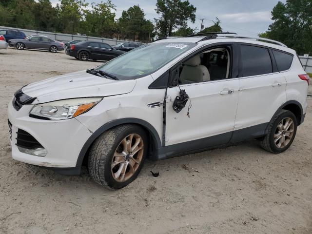 FORD ESCAPE TIT 2014 with VIN 1FMCU0JX2EUD77910 - Photo from auction