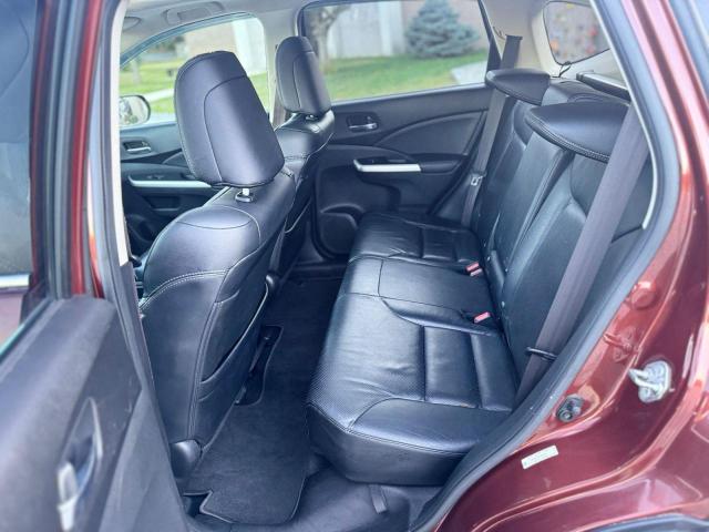 Photo 6 from auction – 2015 HONDA CR-V EXL with VIN 2HKRM4H76FH682317