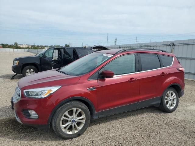 FORD ESCAPE SE 2017 with VIN 1FMCU9GD9HUD73634 - Photo from auction