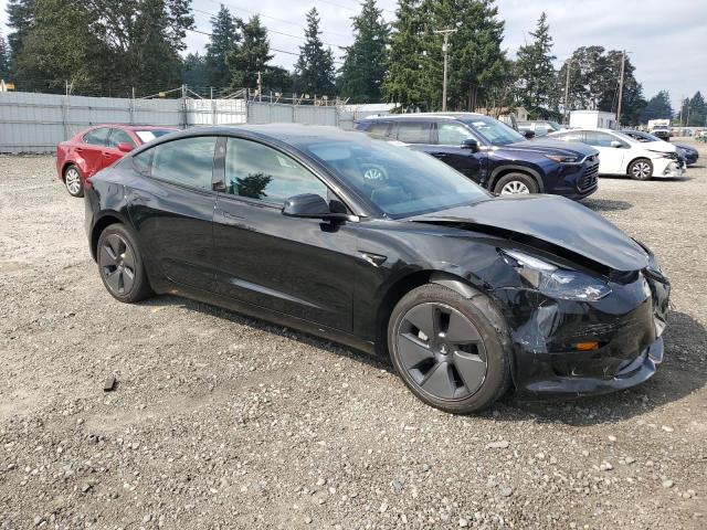 Photo 4 from auction – 2023 TESLA MODEL 3 with VIN 5YJ3E1EA1PF565990