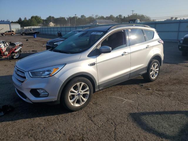FORD ESCAPE SE 2018 with VIN 1FMCU0GD9JUD00670 - Photo from auction
