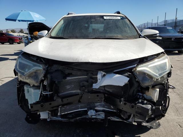 Photo 5 from auction – 2017 TOYOTA RAV4 XLE with VIN JTMWFREV0HJ127628