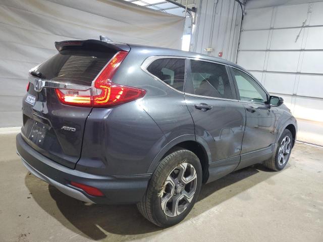 Photo 3 from auction – 2018 HONDA CR-V EX with VIN 7FARW2H54JE028599