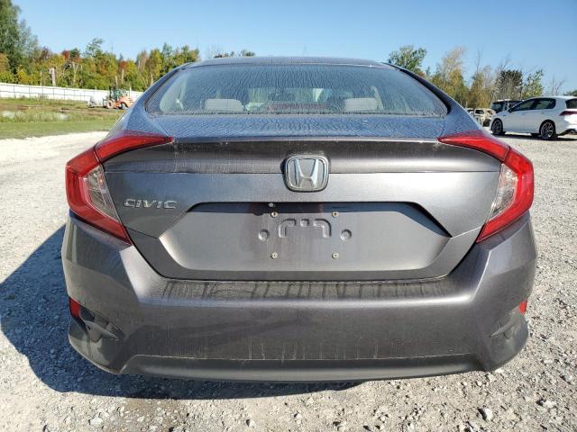 Photo 6 from auction – 2017 HONDA CIVIC LX with VIN 2HGFC2F50HH561162