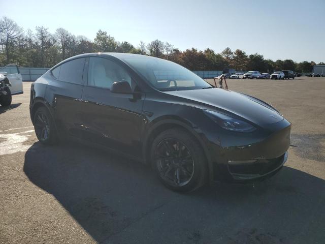 Photo 4 from auction – 2022 TESLA MODEL Y with VIN 7SAYGAEE0NF520218