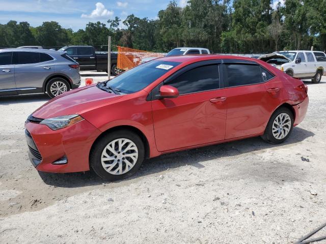 TOYOTA COROLLA L 2018 with VIN 5YFBURHE3JP790029 - Photo from auction