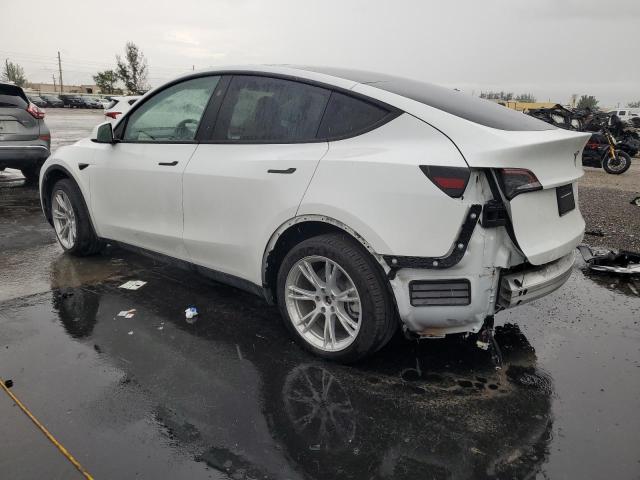 Photo 2 from auction – 2023 TESLA MODEL Y with VIN 7SAYGDED1PF962095