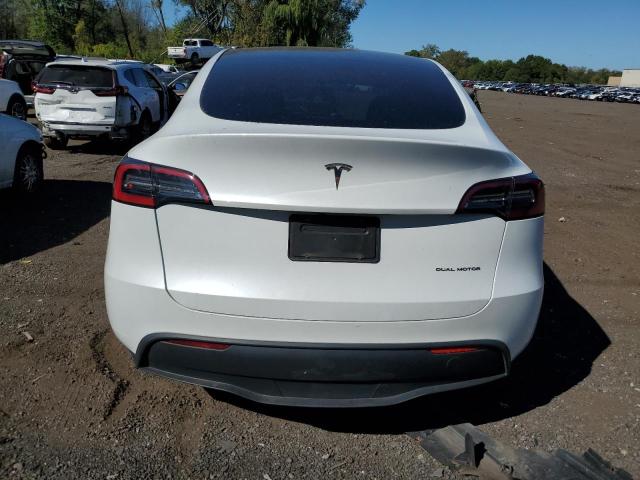 Photo 6 from auction – 2023 TESLA MODEL Y with VIN 7SAYGDEE6PA101405