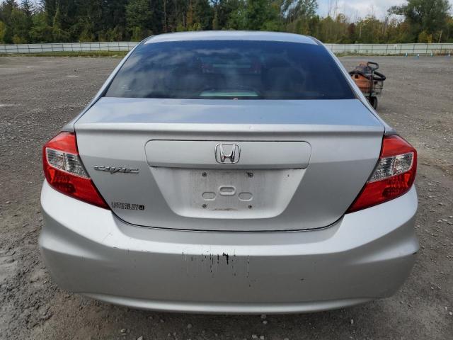Photo 6 from auction – 2012 HONDA CIVIC LX with VIN 19XFB2F58CE081845
