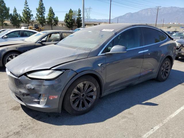 TESLA MODEL X 2017 with VIN 5YJXCBE20HF054813 - Photo from auction