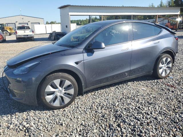TESLA MODEL Y 2023 with VIN 7SAYGDEE3PA166793 - Photo from auction