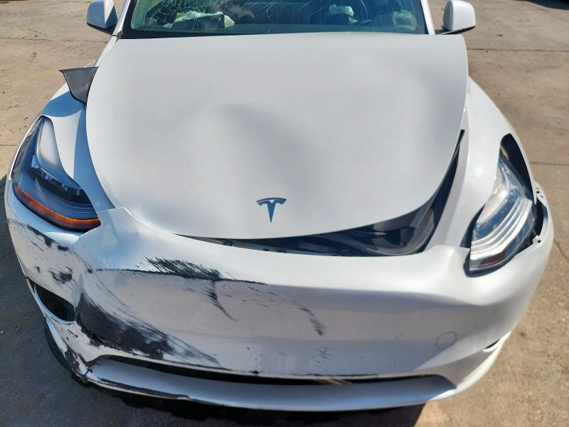 Photo 11 from auction – 2021 TESLA MODEL Y with VIN 5YJYGDED7MF107622