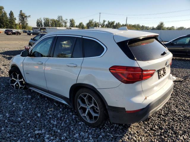 Photo 2 from auction – 2016 BMW X1 XDRIVE2 with VIN WBXHT3C31G5F66821