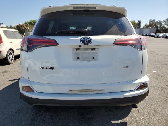 Photo 6 from auction – 2017 TOYOTA RAV4 LE with VIN JTMZFREV9HJ715962