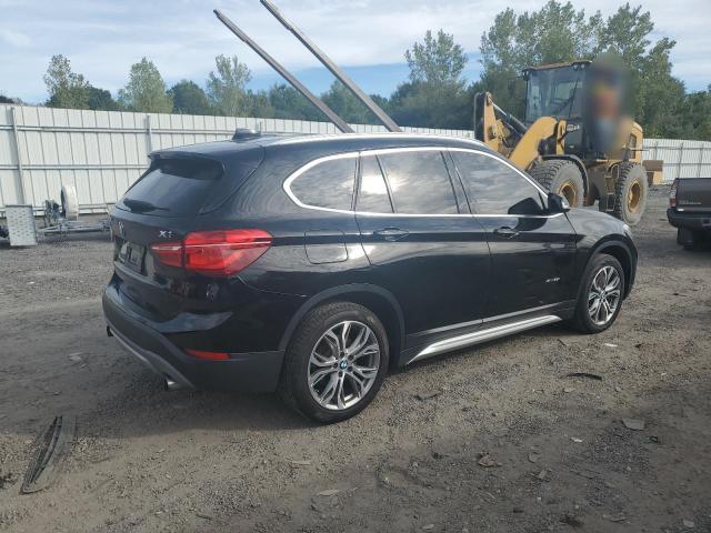 Photo 3 from auction – 2017 BMW X1 XDRIVE2 with VIN WBXHT3Z34H4A64920