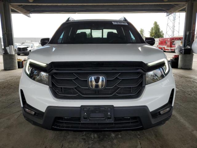 Photo 5 from auction – 2021 HONDA RIDGELINE with VIN 5FPYK3F89MB024744