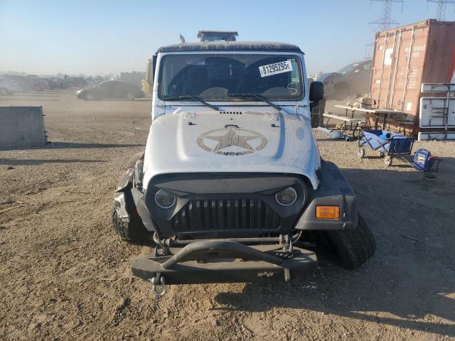 Photo 5 from auction – 2003 JEEP WRANGLER C with VIN 1J4FA39S63P356911