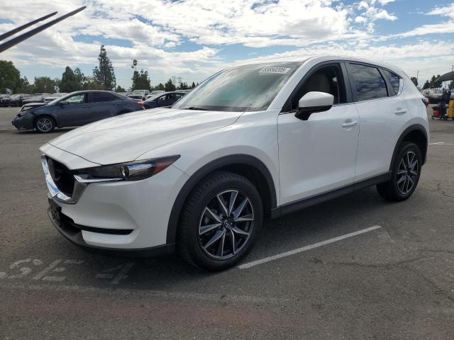 MAZDA CX-5 TOURI 2018 with VIN JM3KFACM2J1361650 - Photo from auction