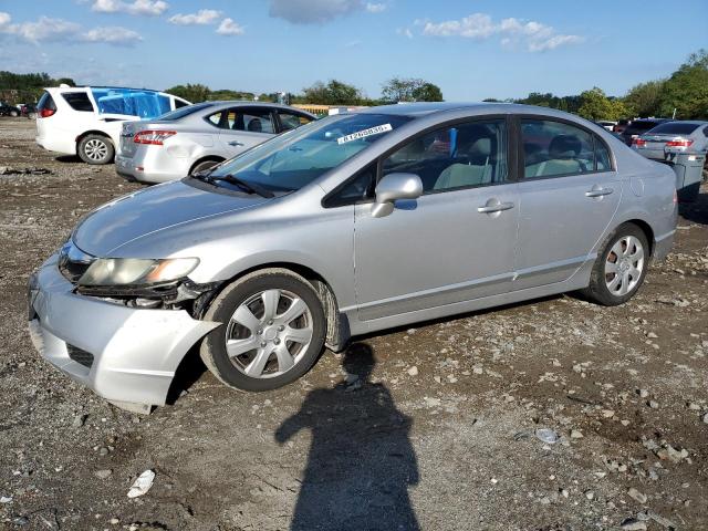 HONDA CIVIC LX 2011 with VIN 19XFA1F55BE038530 - Photo from auction