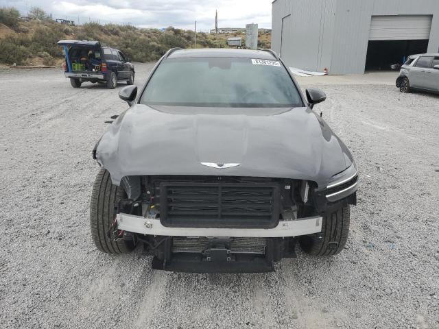Photo 5 from auction – 2023 GENESIS GV70 BASE with VIN KMUMADTB3PU095494