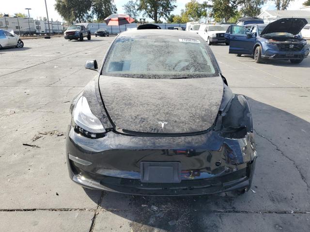 Photo 5 from auction – 2023 TESLA MODEL 3 with VIN 5YJ3E1EA0PF697557