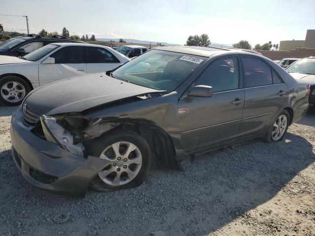 TOYOTA CAMRY LE 2005 with VIN 4T1BF30K55U611860 - Photo from auction