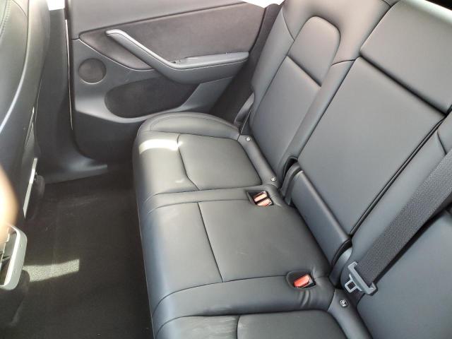 Photo 10 from auction – 2023 TESLA MODEL Y with VIN 7SAYGDEF1PF665541
