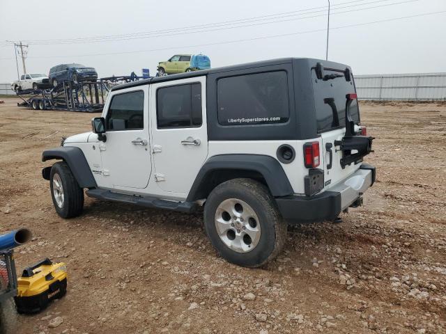 Photo 2 from auction – 2013 JEEP WRANGLER U with VIN 1C4BJWEG1DL626904