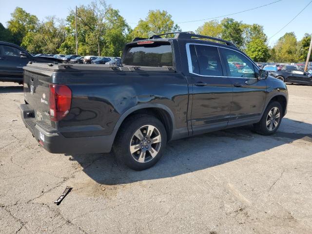 Photo 3 from auction – 2017 HONDA RIDGELINE RTL with VIN 5FPYK3F50HB037524