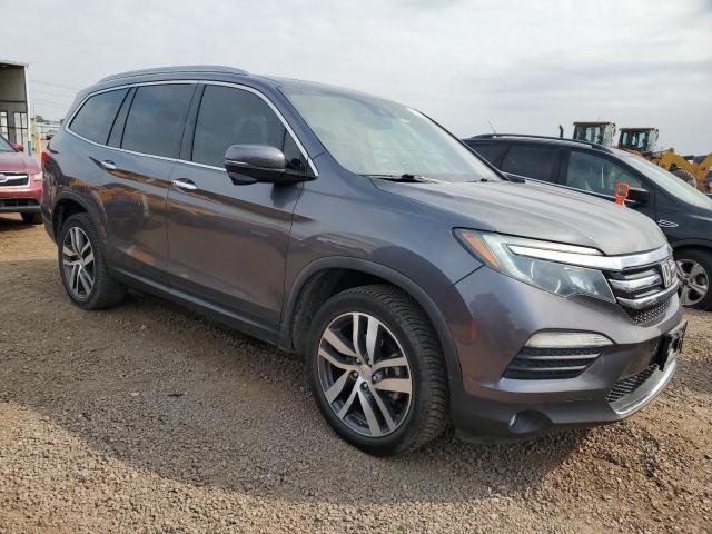 Photo 4 from auction – 2017 HONDA PILOT TOURING with VIN 5FNYF6H91HB019838