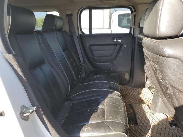 Photo 10 from auction – 2006 HUMMER H3 with VIN 5GTDN136268155628