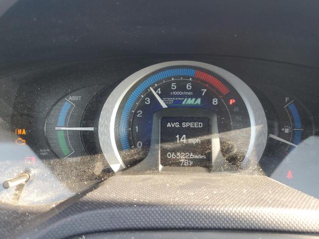Photo 9 from auction – 2010 HONDA INSIGHT EX with VIN JHMZE2H75AS017743
