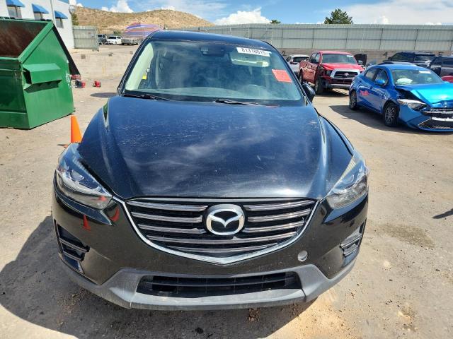Photo 5 from auction – 2016 MAZDA CX-5 with VIN JM3KE2DY0G0849942