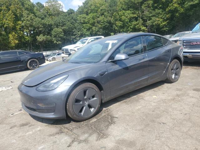 TESLA MODEL 3 2022 with VIN 5YJ3E1EB5NF184052 - Photo from auction
