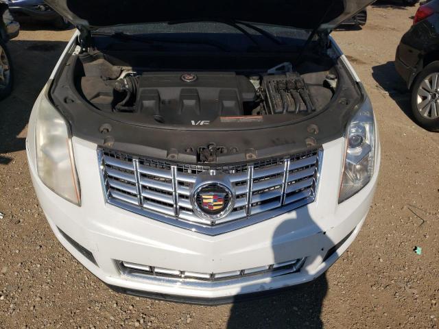 Фото 11 с аукциона – 2014 CADILLAC SRX с VIN 3GYFNAE32ES563405