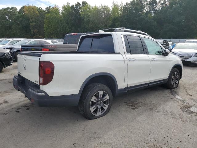 Photo 3 from auction – 2017 HONDA RIDGELINE with VIN 5FPYK3F74HB017097