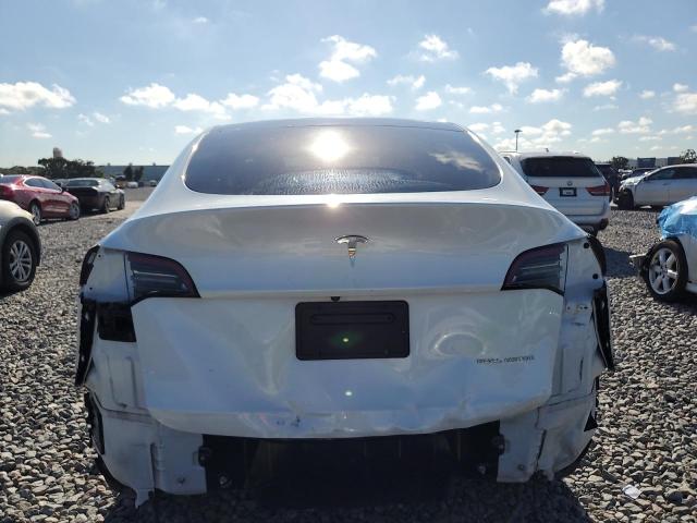 Photo 6 from auction – 2023 TESLA MODEL Y with VIN 7SAYGDEE8PA069461