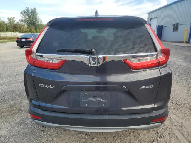 Photo 6 from auction – 2017 HONDA CR-V EX with VIN 2HKRW2H50HH672477
