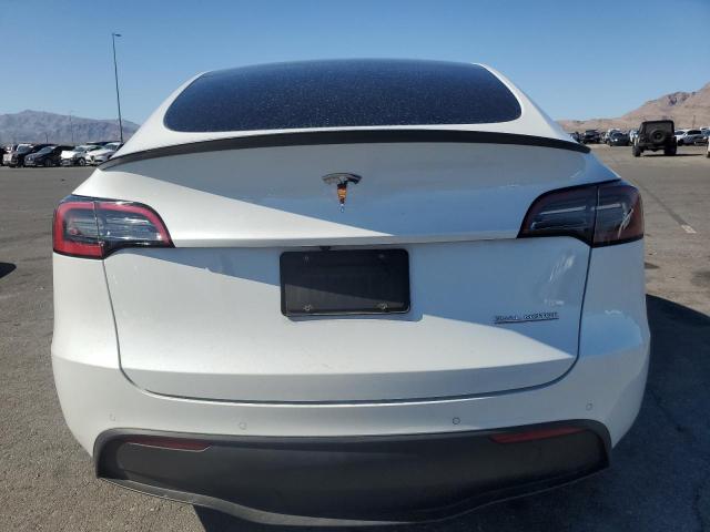 Photo 6 from auction – 2022 TESLA MODEL Y with VIN 7SAYGDEF2NF461067