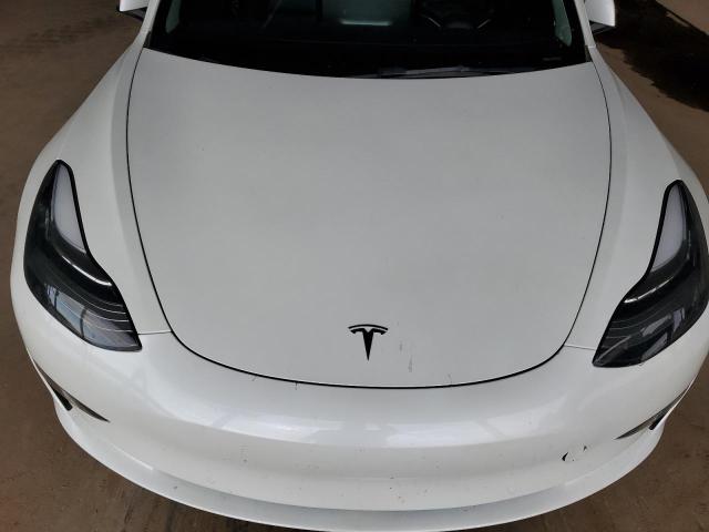 Photo 11 from auction – 2022 TESLA MODEL 3 with VIN 5YJ3E1EB6NF297413