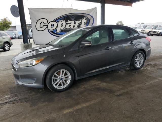 FORD FOCUS SE 2015 with VIN 1FADP3F26FL316975 - Photo from auction