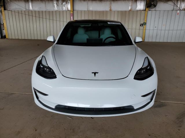 Photo 5 from auction – 2022 TESLA MODEL 3 with VIN 5YJ3E1EA8NF331438