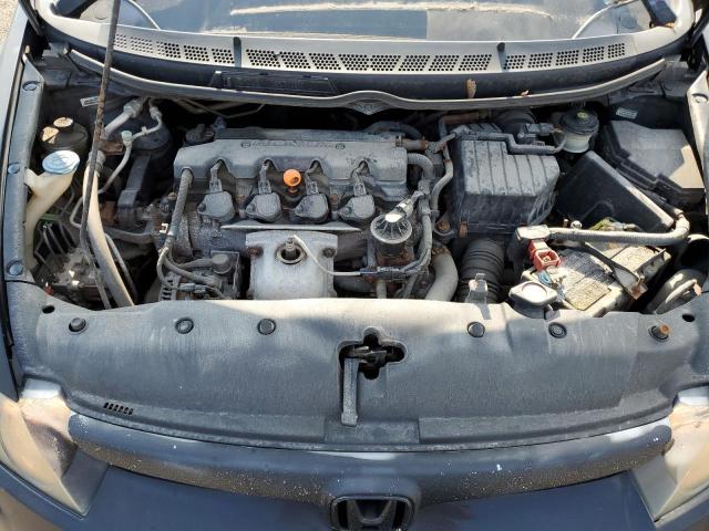 Photo 11 from auction – 2007 HONDA CIVIC DX with VIN 2HGFA16397H018339
