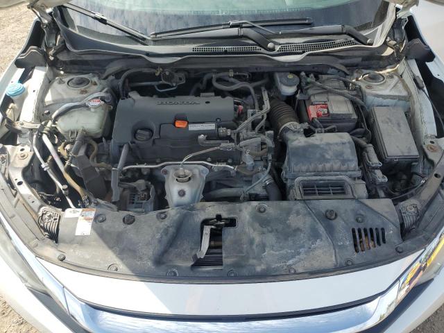 Photo 11 from auction – 2017 HONDA CIVIC LX with VIN 2HGFC2F51HH039320